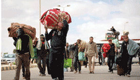 Les libyens fuient leur pays,Quelque 200 immigrants débarquent en Sicile