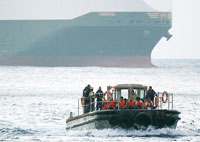 Australie : des migrants «déroutent» un cargo de Singapour