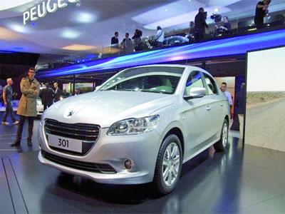 Pour promouvoir le moteur 3 cylindres de la Peugeot 301,La lionne sillonnera les routes d’Algérie sur 5 000 km
