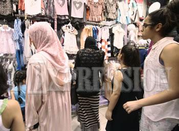 Les parents face à l&rsquo;«équation» des vêtements de l&rsquo;aid,Le casse-tête chinois