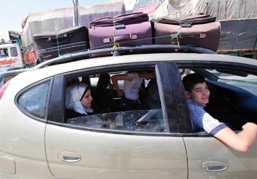 Syrie: Par peur des missiles, des familles se réfugient au Liban