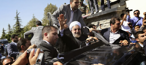 Accueil contrasté pour Hassan Rohani à son retour en Iran