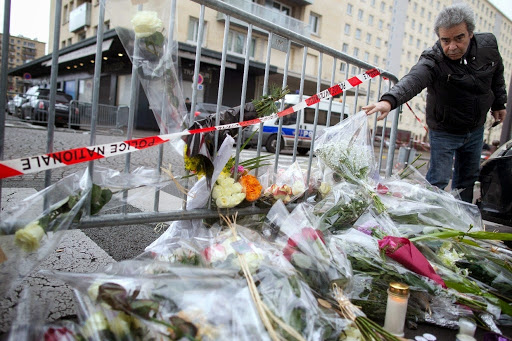 Attentats de Paris, Quatre hommes mis en examen et emprisonnés
