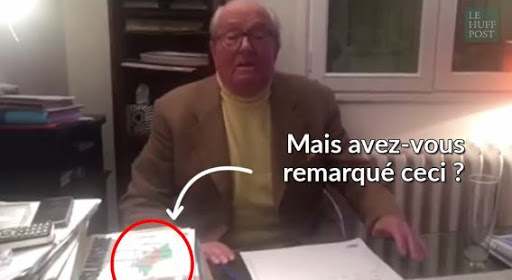 Jean-Marie Le Pen fête la victoire du FN avec un Drapeau algérien sur le bureau