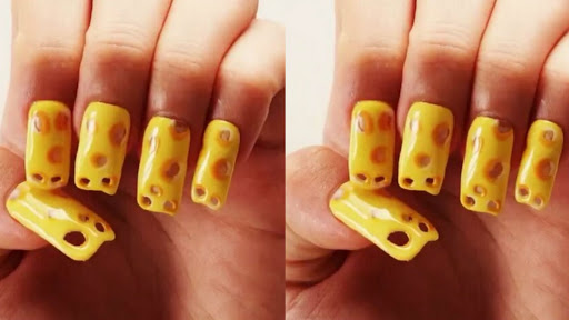 Ce nail art inspiré du gruyère ne va pas aider ceux qui aiment se ronger les ongles