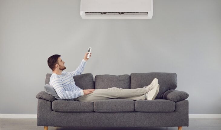air conditioner, man, sofa, living room, air, home, furniture, interior, cooling, ventilation, cooler, vent, air conditioner, air conditioner, air conditioner, air conditioner, air conditioner